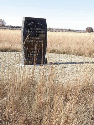 A memorial to Deputy Marshal Robert J. Hammers stands amid native Kansas grasses at Hammers Prairie Park and Nature Center. Donations have a played a key role in development of the park being ahead of schedule. Contributed photo