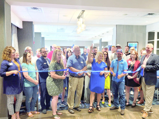 Members of the Goddard Chamber of Commerce hosted a ribbon cutting last Thursday evening for The Dam Jam Music Festival. The music festival will be held July 19-20 just south of Kellogg, across from Walmart. Paul Rhodes/TSnews.com