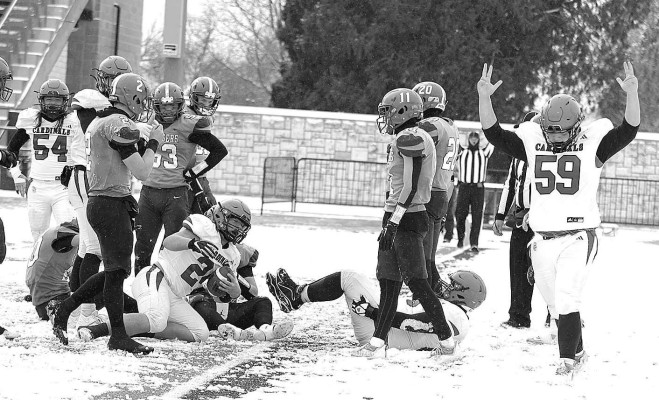 The Conway Springs Cardinals celebrate a touchdown during last November’s Class 1A State championship football game, which was played at Lewis Field on the Fort Hays State University campus. It was the last State football game played in Hays. A new format in 2024 will consolidate nine State games to three locations. If the Cardinals go to State again, they will play in Hutchinson. Stephanie McKennon/TSnews