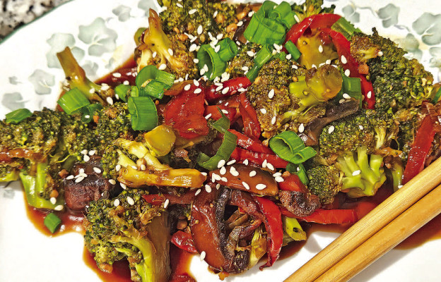 Chinese vegetable stir fry is heavy on the broccoli but really packs some great flavor with seasonings and the addition of earthy mushrooms and fresh garlic and ginger.