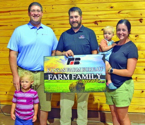 Joseph and Theresa Neville were named Farm Family of the Year at the Sedgwick County Farm Bureau meeting. Dale Stelz/TSnews