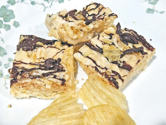 Potato chip krispies treats trades out the traditional rice cereal to create a sweet and salty no-bake treat that is absolutely delicious.