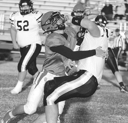 Conway Springs’ Ranger Reeps makes a big tackle during the Cardinals’ home playoff victory against the Bennington Bulldogs. Stephanie McKennon/TSnews