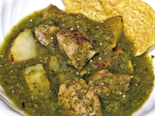 Chile verde spends a lot of time simmering in a pot, but putting it together is really easy. With plenty of fresh pepper and onion flavors, it’s a filling and excellent meal.