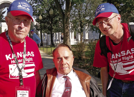 Wendell Hill, left, and his son, Brent, met former U.S. Sen. Bob Dole in 2015 when Hill was part of an Honor Flight to Washington, D.C. The elder Hill has been named grand marshal of this year’s Veterans Day parade in Cheney. Contributed photo