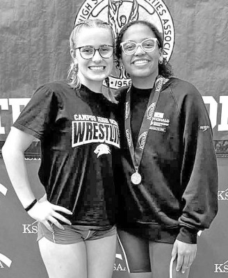 Campus diver Joslyn Cox, left, and swimmer Kimberlyn Grim competed at State last week. Contributed photo