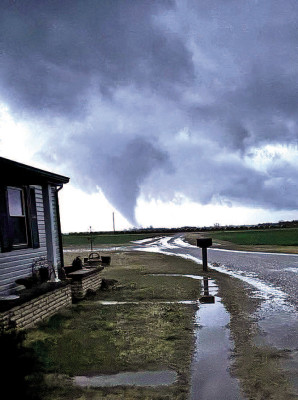 As lightning lit up the sky, this Sumner County tornado was captured east of the farm of Phil and Brenda Harper. Contributed photo