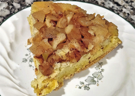 Russian apple pie cake is made with only five ingredients. It results in a light and fluffy sponge cake with a crisp base and warm, spiced apples on top.
