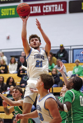 Eisenhower’s Pierce Blue puts up a short-range jump shot during the Tigers’ homecoming game against the Derby Panthers, ranked No. 2 in Class 6A. Matt Buchar/Ginger Viking Fotos
