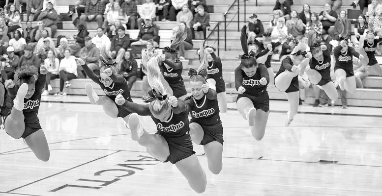 Campus Colts cheerleaders perform a stunt during last week’s home basketball games against the Eisenhower Tigers at the CHS gym, also called the Stable. Stephanie McKennon/TSnews