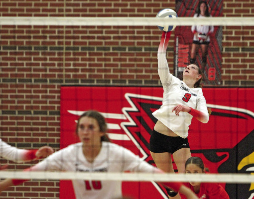 Lairen Pauly serves during Conway Springs’ substate championship win over St. Mary’s-Colgan. The Cardinals lost the first set but bounced back win the match 2-1. Travis Mounts/TSnews