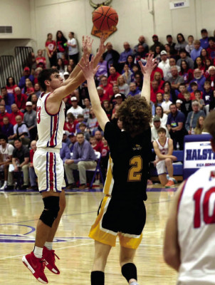 Jase Robertson makes a 3-point basket during Cheney’s win over Haven on Saturday. The Cardinals earned a return trip to the Class 3A State tournament in Hutchinson starting on Thursday. Andrea McDaniel/TSnews