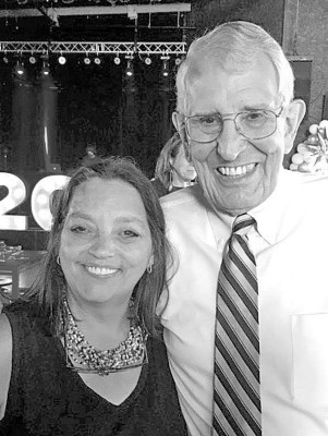 Dr. Charise Frisch, pictured with her father, Dr. Ronald Higgins, is retiring from her dental practice. She practiced for years with her father; he retired in 2021. Contributed photo
