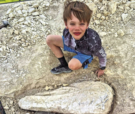 Corbin Bullard, a member of the Ninnescah Valley 4-H Club, recently presented his fossil discovery during a Sedgwick County 4-H Geology Club meeting. Bullard named the fossil, a Tylosaurus, Harry. Contributed photo