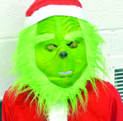 The Grinch made an appearance at the Christmas Kickoff in Garden Plain, but in the end his heart grew three sizes. Paul Rhodes/TSnews