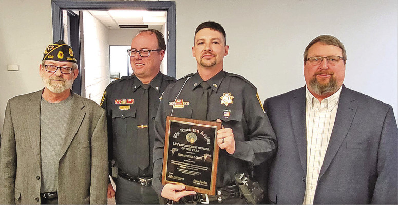 Sgt. LeVon Crotts, second from right, is the American Legion Law Enforcement Officer of the Year. Pictured with him are, from left, post commander Steve Tackett, Haysville Police Chief Jeff Whitfield, and Haysville Mayor Russ Kessler. Contributed photo