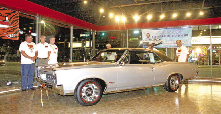 Hot rod club unveils fallen deputy's restored car