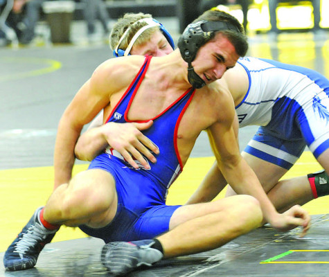 Colton Veach works out of a hold during a match at last week’s Garden Plain tournament. He placed fourth at 157 pounds. Dale Stelz/TSnews