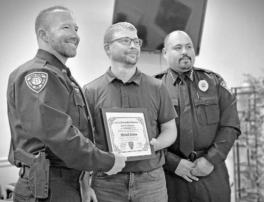 A ceremony was held at last week’s Conway Springs City Council meeting, where Mitchell Nedrow, left, was promoted to sergeant with the Conway Springs Police Department. He is pictured with Mayor T.J. Sones, center, and Police Chief Jesse Velazquez. Paul Rhodes/TSnews