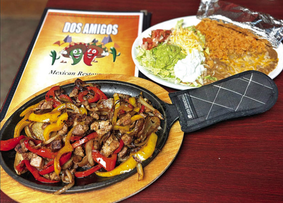 The pork fajitas are one of the many dishes available at Dos Amigos Mexican Restaurant, which is now open in Goddard at 19940 W. Kellogg, Suite B.
