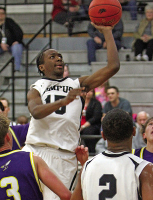 Tamarien Moore drives into the lane during the second half of Campus’ game against Valley Center last Friday. Travis Mounts/TSnews