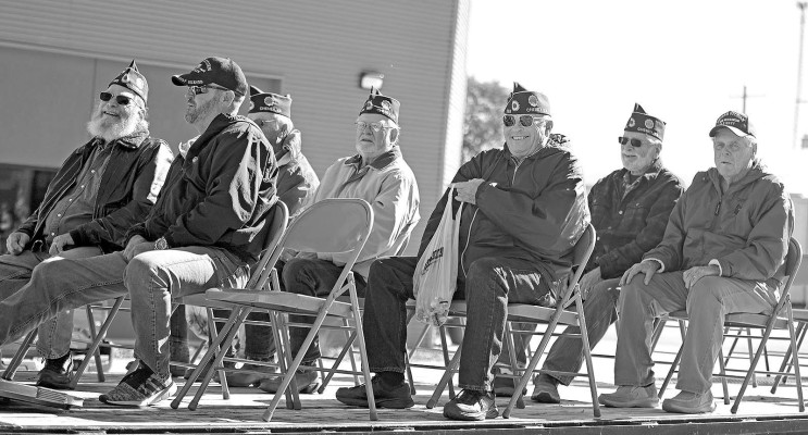 Veterans wave during Saturday morning's Veterans Day parade, which was held on Main Street in Cheney. Each November, American Legion Post 295 puts on a parade and holds a luncheon to honor the service of its members and all veterans. Stephanie McKennon/TSnews