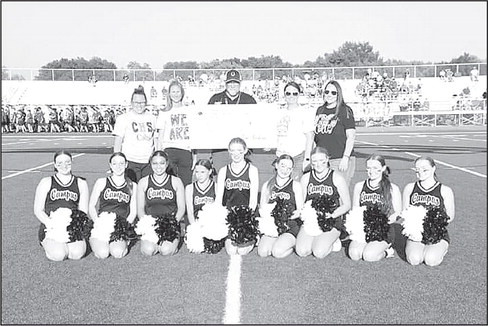 Friday night at the Colts versus Goddard Lions football game, the Campus Athletic Booster Club presented the Campus Athletic Department a check for $21,000. Campus High School athletics director Ron Allan receives the check, which represents the total earned from sponsors, merch sales, concessions, and all booster club fundraising for the 2022-2023 school year. Contributed photo
