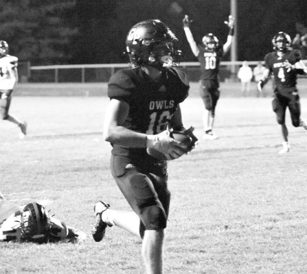 Cooper Baker, a Garden Plain sophomore, runs in a touchdown pass during the Owls’ home playoff game against the Ellsworth Bearcats last Friday. John Bloomquist/Contributed photo