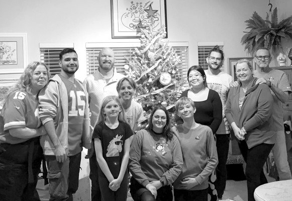 The Rhodes/Swansen family gathers for a photo at the end of Christmas Day. Contributed photo