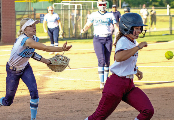 Camryn Carlson tosses the ball to first base for an out during the Indians’ regional championship victory over the Buhler Crusaders. Makayla Wassengber/ MLW Photography