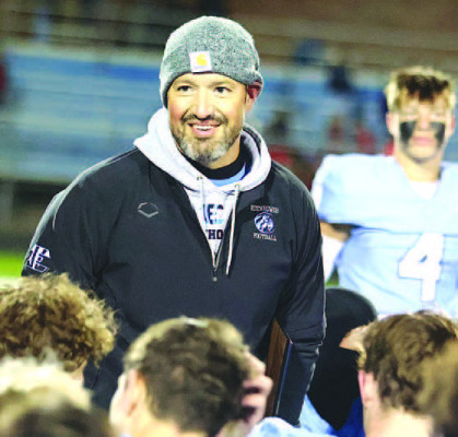 Eisenhower head football coach Darrin Fisher talks to his players after a playoff victory over Maize. Fisher will be an assistant coach at the 2024 Shrine Bowl. Stephanie McKennon/TSnews
