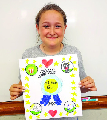 Michelle Lange shows off her Kansas State Fair T-shirt design. Contributed photo