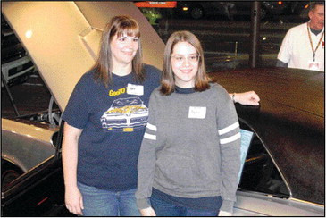 Kathleen and Alyssa Kunze were on hand for the unveiling of the car that Alyssa was to work on with her father, Sedgwick County Sheriff’s Deputy Robert Kunze, who died while on duty in 2018. The car will have its public unveiling at this weekend’s car show. Travis Mounts/TSnews