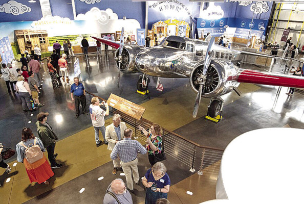 The first visitors pour in to see the last remaining Lockheed Electra 10-E, a twin engine, American-made aircraft named Muriel. The plane is the centerpiece of the new Amelia Earhart Hangar Museum, which opened April 14 in Atchison. Julie Denesha/Kansas News Service