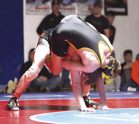 Gage Lee of Garden Plain rides down an opponent during the 3-1A regional in Eureka. He was a regional champion at 175 pounds. Contributed photo