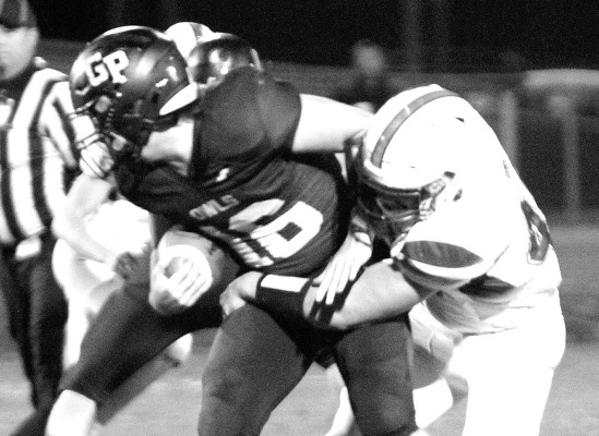 Cooper Baker stepped in as Garden Plain’s starting running back last Friday and led the Owls to a playoff win against the Douglass Bulldogs. It was the Owls’ second win over Douglass in less than a month. Travis Mounts/TSnews