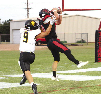 Carson VIneyard of the Argonia-Attica Titans makes an interception in the end zone, snuffing out a scoring opportunity for the Cedar Vale-Dexter Spartans. Travis Mounts/TSnews