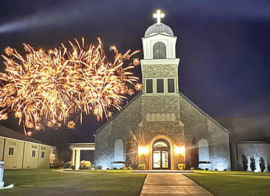 Fireworks go off behind St. Rose Catholic Church in Mount Vernon during the recent St. Rose Day. The parish has seen tremendous growth since the new church opened four years ago. Contributed photo