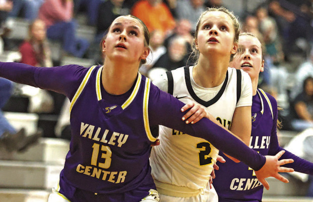 Campus freshman Norah Seeley (2) fights for rebounding position between two Valley Center players. The Colts fell behind after a bad first half, but played some of their best basketball for a comeback victory. Stephanie McKennon/TSnews