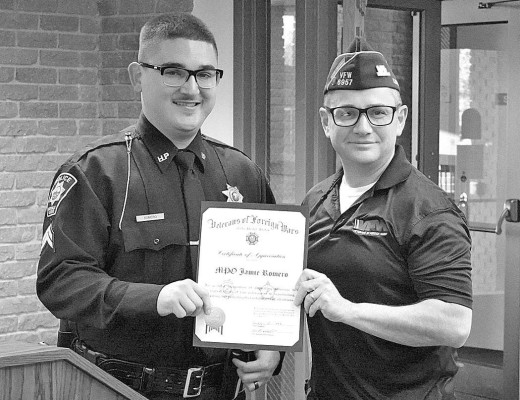 Master Police Officer Jaime Romero, left, recently was named the officer of the year in Haysville. Contributed photo