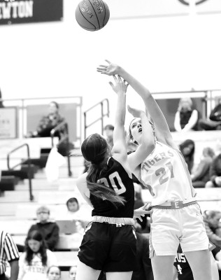 Eisenhower’s Payton Blue takes a shot over Campus defender Brooke Pfeiffer during last week’s game in Goddard. Matt Bucher/Ginger Viking Fotos