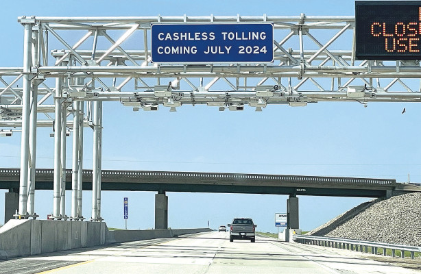 Gantries like this one on I-335 between Emporia and Topeka will track the number of miles that Kansas Turnpike users drive. A majority of drivers use KTAG and won’t notice a difference. About 25 percent of drivers have been paying cash. Starting July 1, they will be sent invoices for using the turnpike. Travis Mounts/TSnews