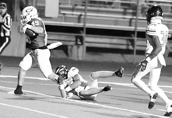 Joe Diekemper crosses the goal line for a Goddard touchdown. The Lions came back in the second half to defeat Maize South in the Class 5A playoffs. Stephanie McKennon/TSnews