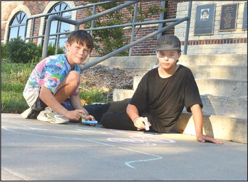 The annual Gathering at the Gazebo took place on Saturday, and it was larger than ever with a newly added art walk. Gavin Romero and Jaremiah Sanchez did their part by creating sidewalk chalk art at the Haysville Community Library. Subscribers can see more Gathering at the Gazebo photos online at tsnews.com. Dale Stelz/TSnews