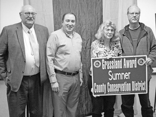 Karen Horton-Pfau received the 2024 Grassland Award at the Sumner County Conservation District annual meeting. Travis Mounts/TSnews