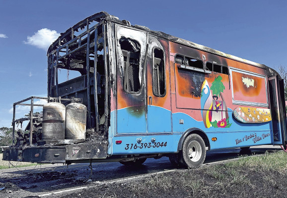 Ken N Barbie’z Rollin Diner caught fire and was destroyed last week while en route to a swim meet in Haysville. Owners Kelly Ake and Barbie Taber are working to find a way to still serve food at the Sedgwick County Fair next week in Cheney. Contributed photo
