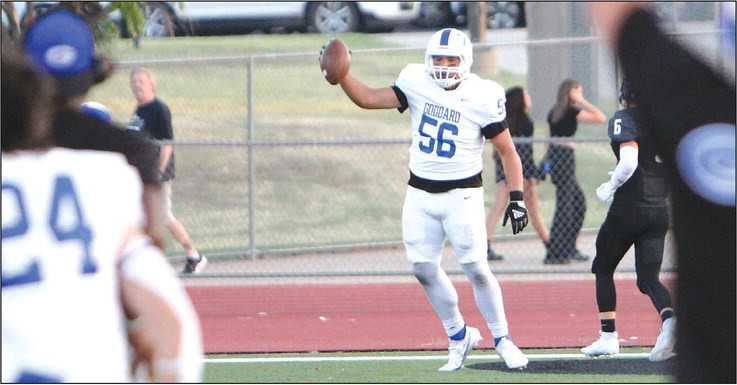 Goddard defender Matrix Eames stands in the end zone after scoring on a pick-6 interception. The play gave the visiting Lions a three-touchdown lead over the Campus Colts during last Friday’s season-opening game for both teams in Haysville. Travis Mounts/TSnews