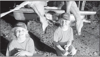 Sisters bag first deer